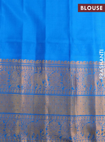 Pure gadwal silk saree pink and cs blue with zari woven buttas and temple design long zari wove border