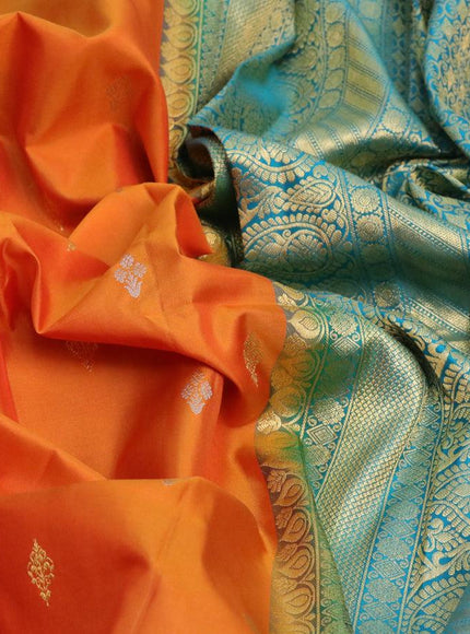 Pure gadwal silk saree orange and cs blue with silver & gold zari woven buttas and temple design zari woven border