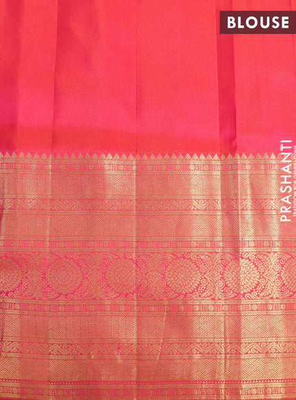 Pure gadwal silk saree green and dual shade of pinkish orange with zari woven buttas and temple design long zari woven border