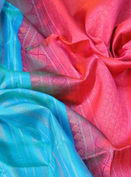 Pure soft silk saree dual shade of cs blue and dual shade of pinkish orange with silver & copper zari weaves and zari woven butta border