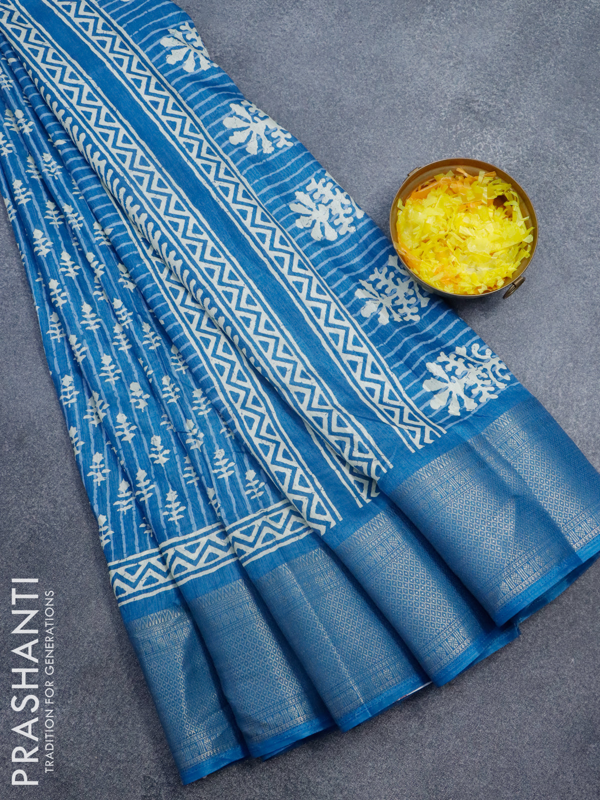 Semi dola saree blue with allover batik butta prints and zari woven bo ...