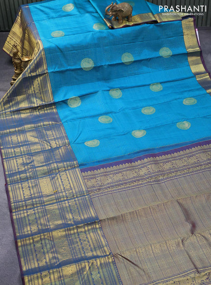 Pure kanjivaram silk saree cs blue and dual shade of maroon with allover zari checks & buttas and long zari woven border