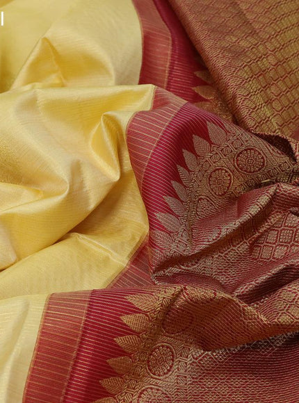 Pure kanjivaram silk saree pale yellow and maroon with allover zari weaves & buttas in borderless style