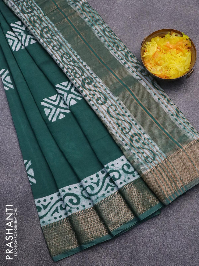 Semi gadwal saree green with allover batik prints and zari woven border