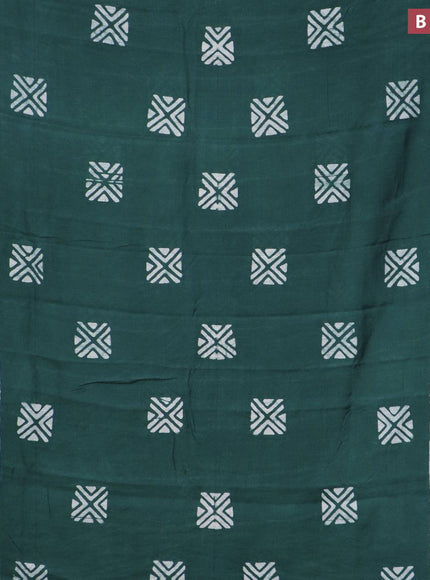 Semi gadwal saree green with allover batik prints and zari woven border