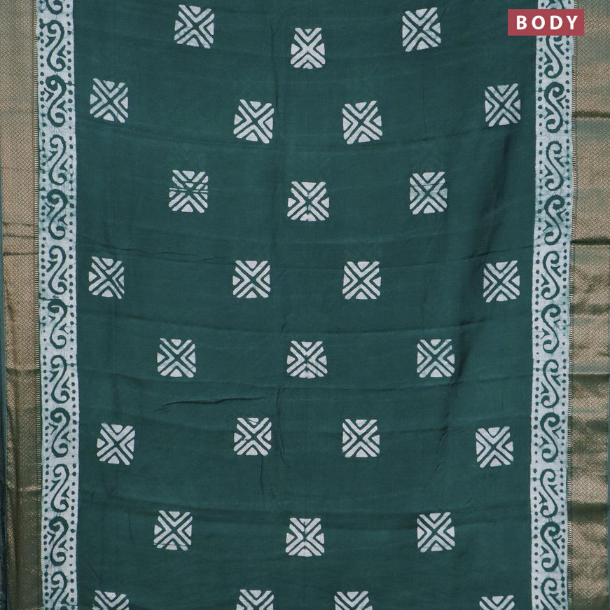 Semi gadwal saree green with allover batik prints and zari woven border