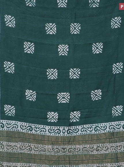 Semi gadwal saree green with allover batik prints and zari woven border