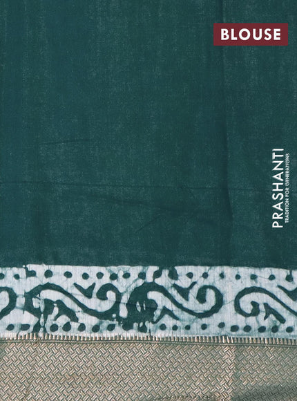 Semi gadwal saree green with allover batik prints and zari woven border