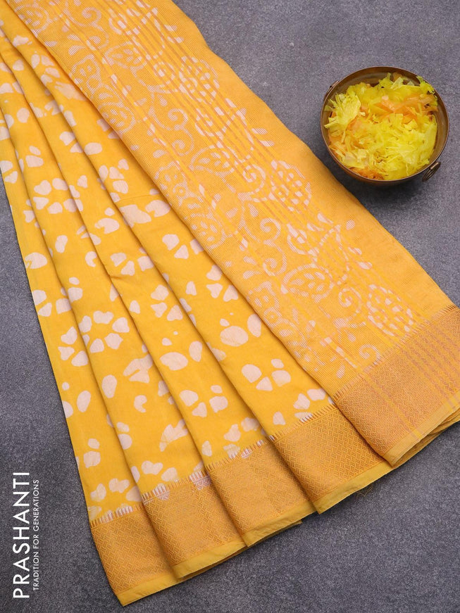 Semi gadwal saree yellow with allover batik prints and zari woven border