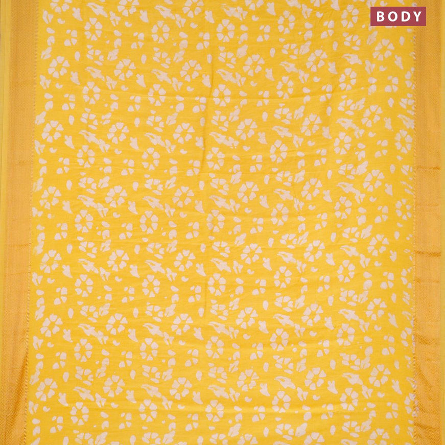 Semi gadwal saree yellow with allover batik prints and zari woven border