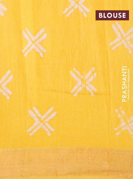 Semi gadwal saree yellow with allover batik prints and zari woven border