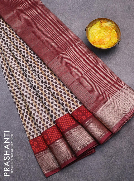 Semi gadwal saree off white black and maroon with allover floral butta prints and zari woven border