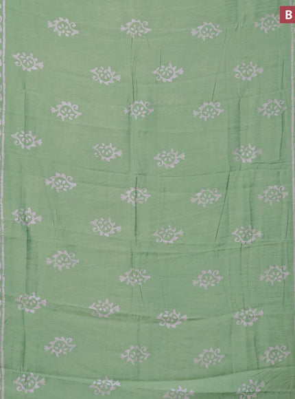 Semi gadwal saree pastel green with batik buttas prints and zari woven border