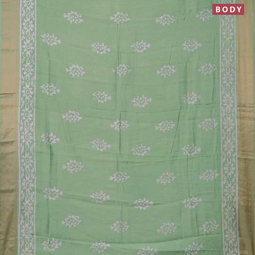 Semi gadwal saree pastel green with batik buttas prints and zari woven border