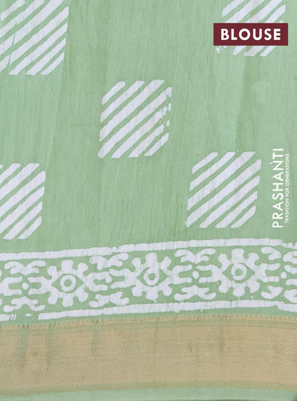 Semi gadwal saree pastel green with batik buttas prints and zari woven border