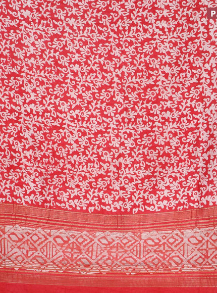 Semi gadwal saree tomato red with allover batik prints and zari woven border