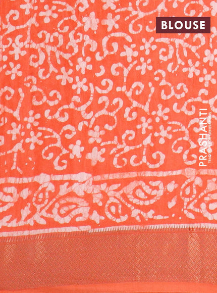 Semi gadwal saree orange with allover batik prints and zari woven border