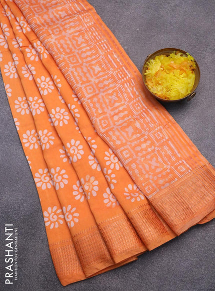 Semi gadwal saree orange with allover batik prints and zari woven border