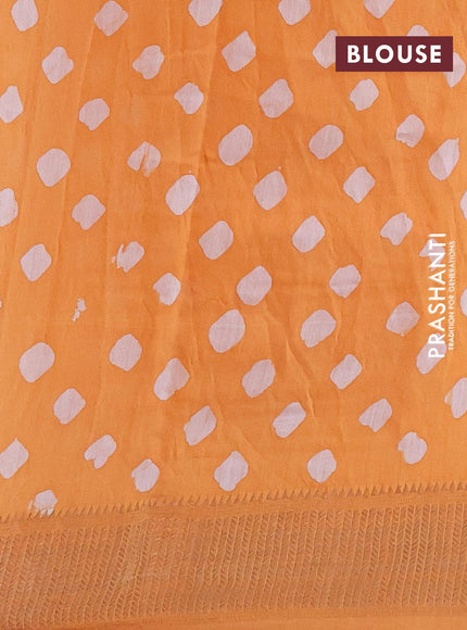 Semi gadwal saree orange with allover batik prints and zari woven border