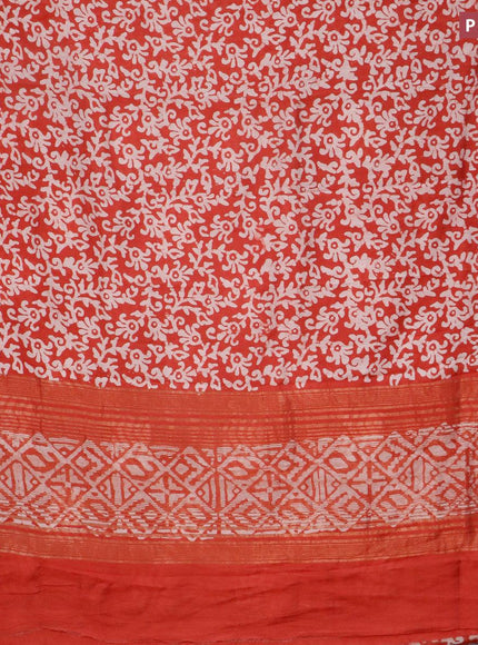 Semi gadwal saree red shade with allover batik prints and zari woven border