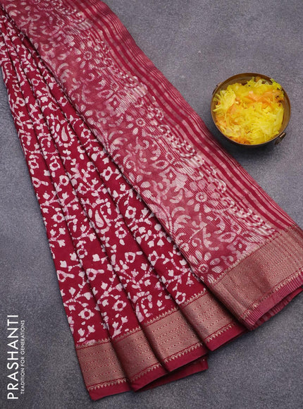 Semi gadwal saree dark magenta pink with allover batik prints and zari woven border