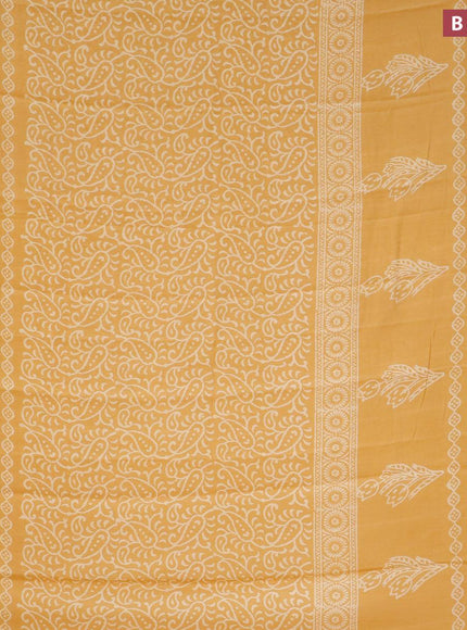 Semi gadwal saree yellow with floral prints and zari woven border