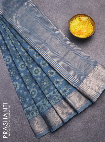 Semi gadwal saree blue shade with allover ajrakh prints and zari woven border