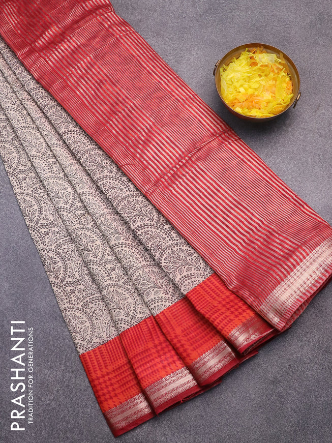 Semi gadwal saree beige black and orange maroon with allover prints and zari woven border