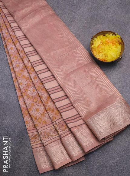 Semi gadwal saree peach shade with allover floral prints and zari woven border