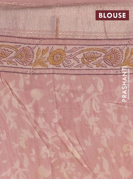 Semi gadwal saree peach shade with allover floral prints and zari woven border