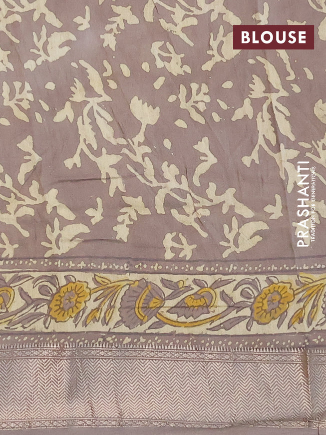 Semi gadwal saree grey shade with allover floral prints and zari woven border