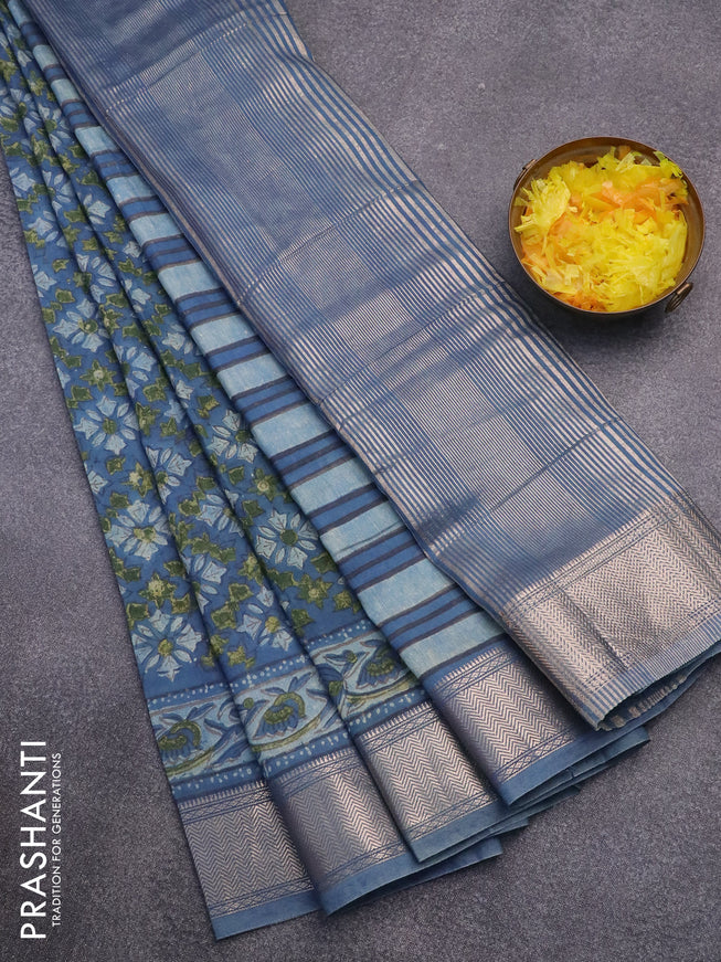 Semi gadwal saree blue with allover floral prints and zari woven border