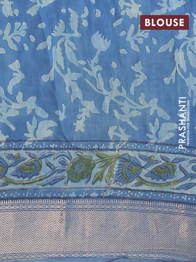 Semi gadwal saree blue with allover floral prints and zari woven border