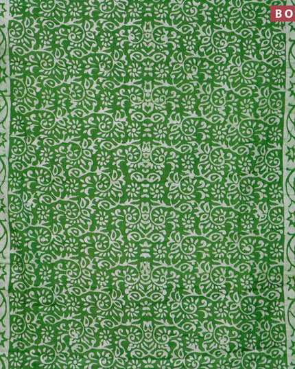 Semi gadwal saree green with allover butta prints and zari woven border