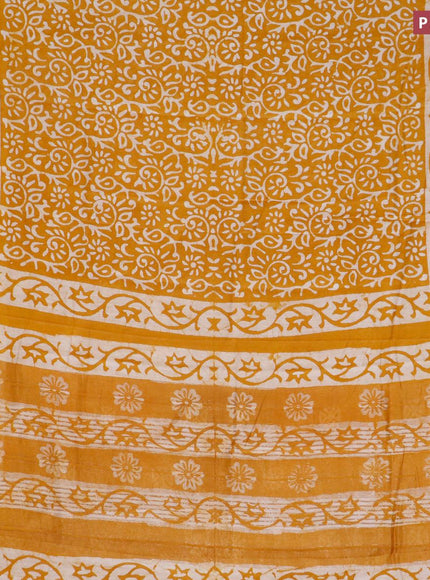 Semi gadwal saree mustard shade with allover butta prints and zari woven border