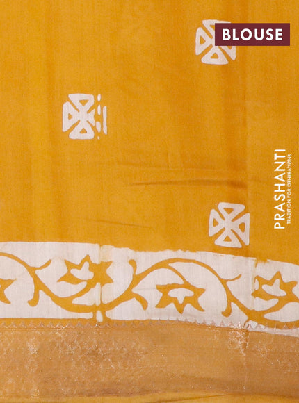 Semi gadwal saree mustard shade with allover butta prints and zari woven border