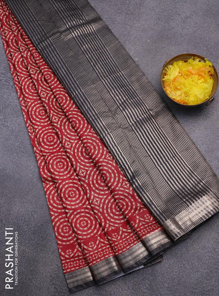 Semi gadwal saree maroon and black with allover geometric prints and zari woven border