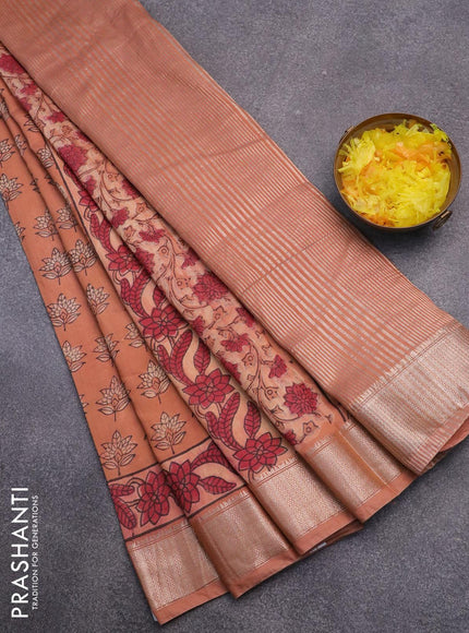 Semi gadwal saree peach orange with allover floral butta prints and zari woven border