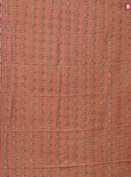 Semi gadwal saree peach orange with allover floral butta prints and zari woven border