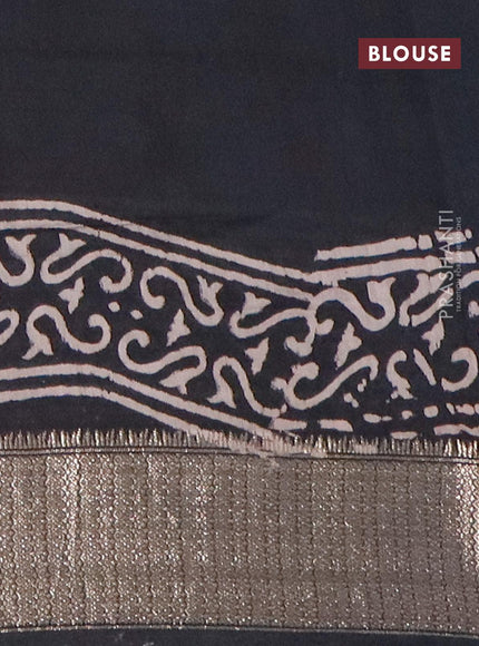 Semi gadwal saree black with allover butta prints and zari woven border