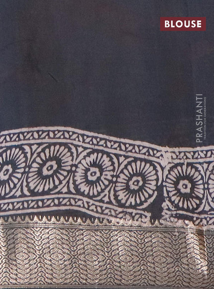 Semi gadwal saree elephant grey with allover prints and zari woven border