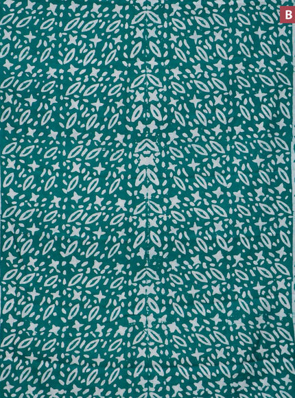 Semi gadwal saree teal green with allover batik prints and zari woven border