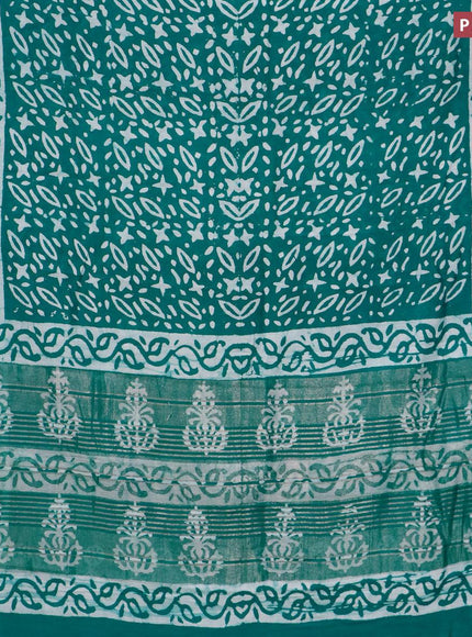 Semi gadwal saree teal green with allover batik prints and zari woven border