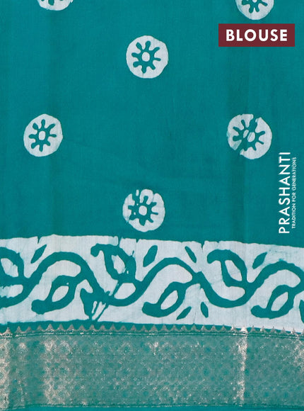 Semi gadwal saree teal green with allover batik prints and zari woven border