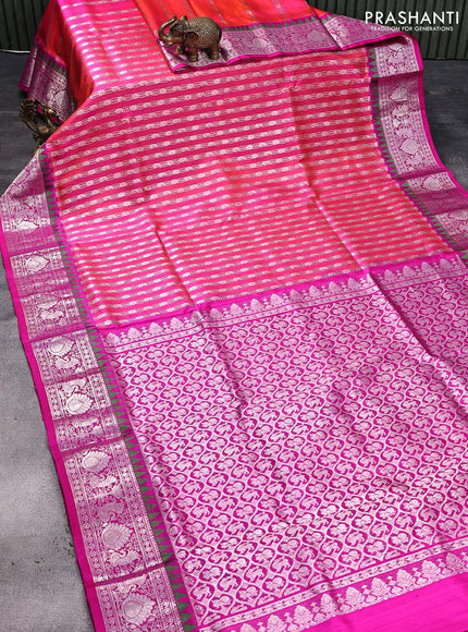 Venkatagiri silk saree dual shade of pink and magenta pink with allover silver zari weaves and temple design silver zari woven border