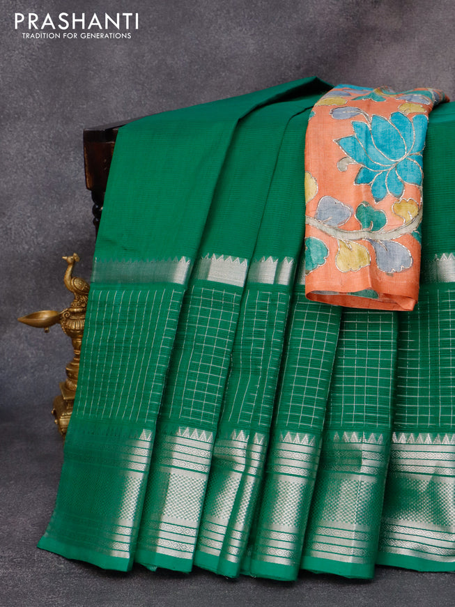 Mangalgiri silk cotton saree green and rust shade with plain body and long silver zari woven checks border & kalamkari hand painted blouse