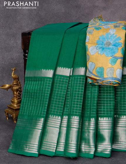 Mangalgiri silk cotton saree green and mustard yellow with plain body and long silver zari woven checks border & kalamkari hand painted blouse