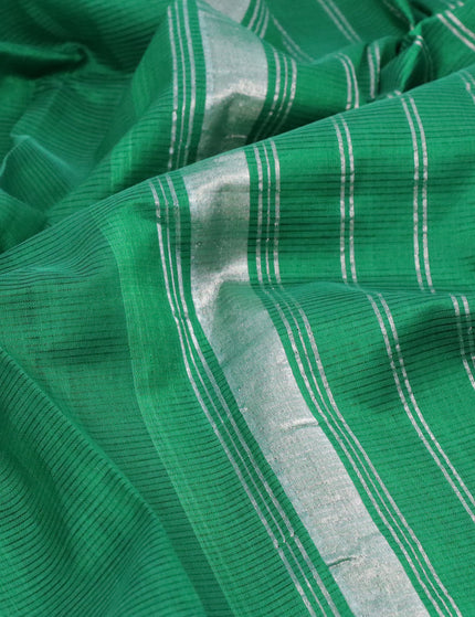 Mangalgiri silk cotton saree green and mustard yellow with plain body and long silver zari woven checks border & kalamkari hand painted blouse