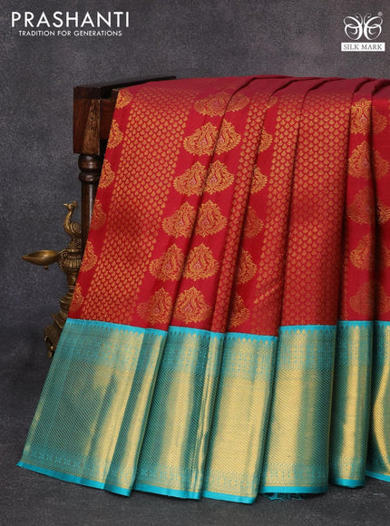 Pure kanjivaram silk saree maroom and teal blue with allover zari weaves & buttas and long zari woven floral border