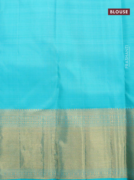 Pure kanjivaram silk saree maroom and teal blue with allover zari weaves & buttas and long zari woven floral border